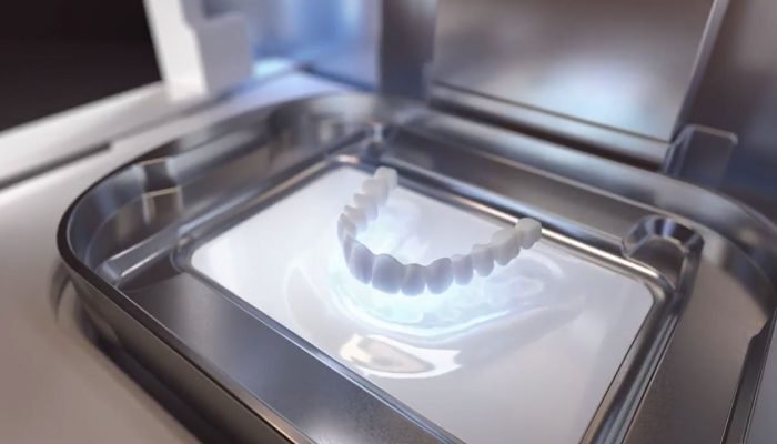 Dental restoration being produced in a 3D printer